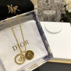Колие от жълто злато с двойни висулки Christian Dior с лого на CD и паважни диаманти, кръг и бяла звезда MOP