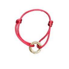 Гривна Trinity de Cartier с диаманти от 18-каратово злато и червен памук