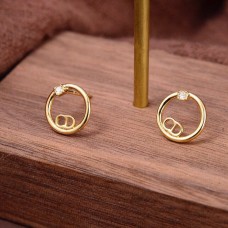 Обеци с кръгло лого на Christian Dior с единичен кристал и жълто позлатено покритие